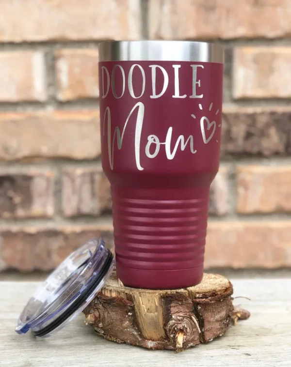 closeup shot of Doodle Mom Thermal Tumbler and a lid