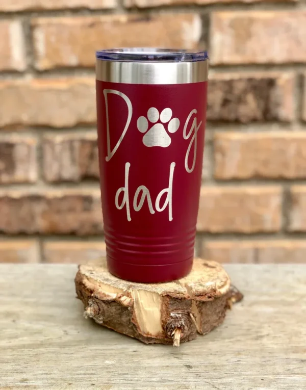 A mug with dog dad written on it