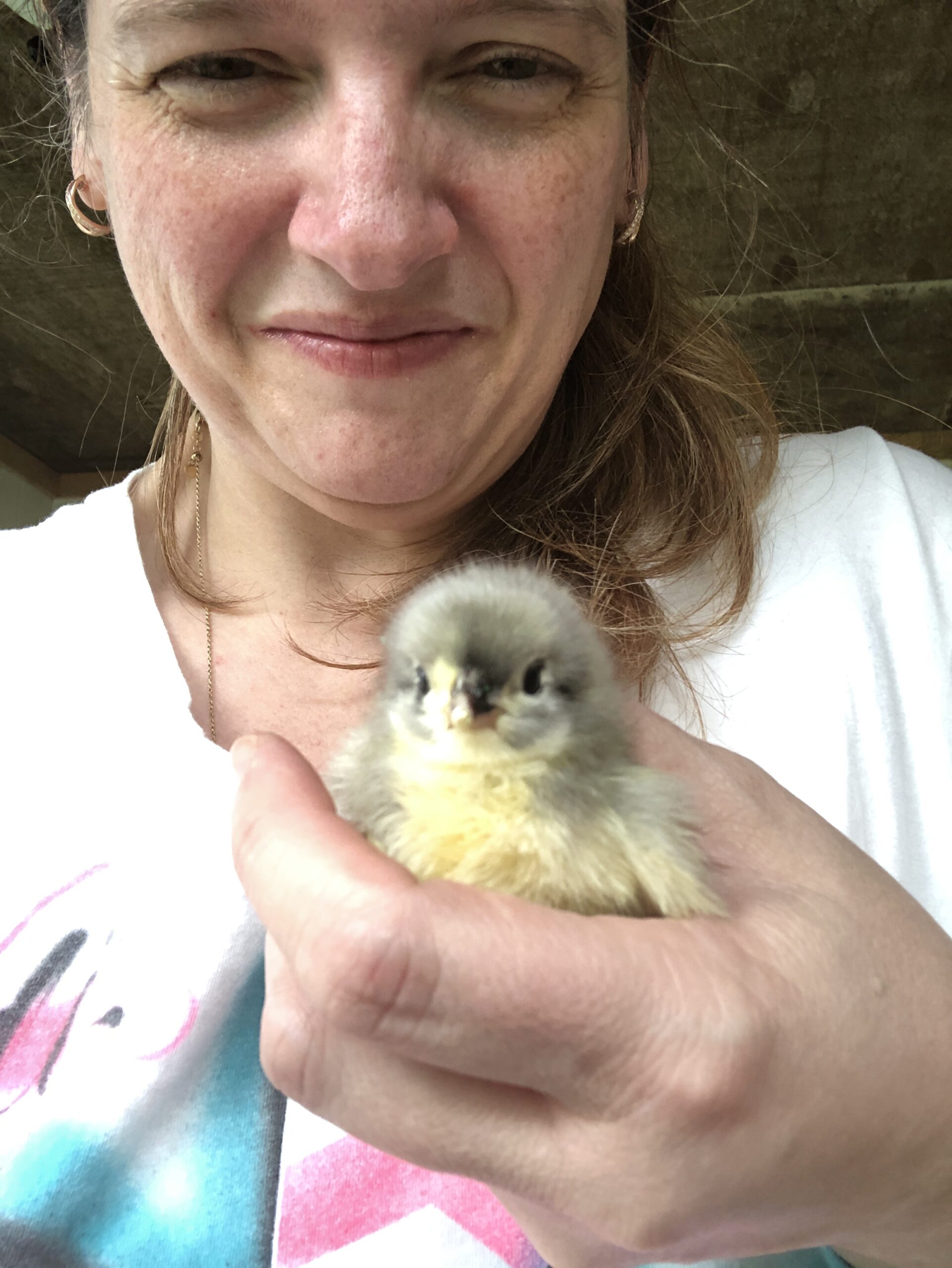 closeup of a woman with a cute chick